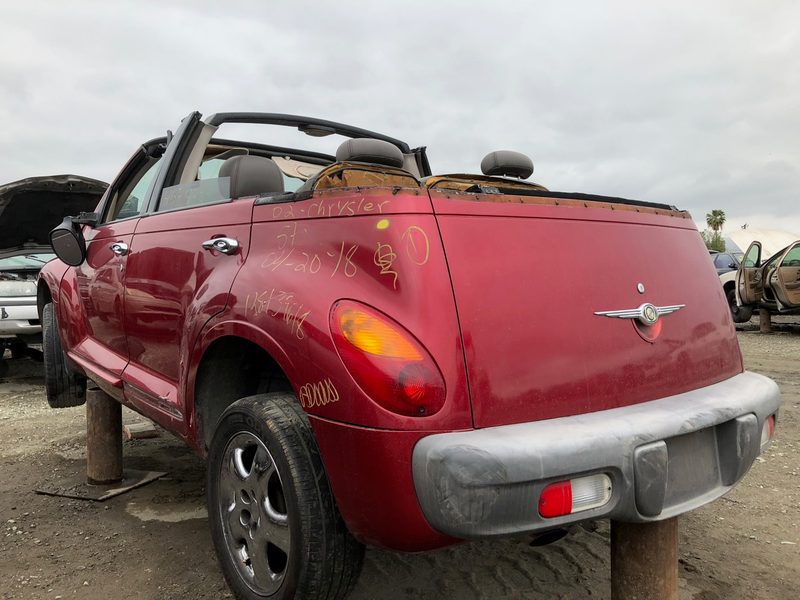 Illustration for article titled This Junkyard PT Cruiser Landaulet Proves Some Battles Can't Be Won